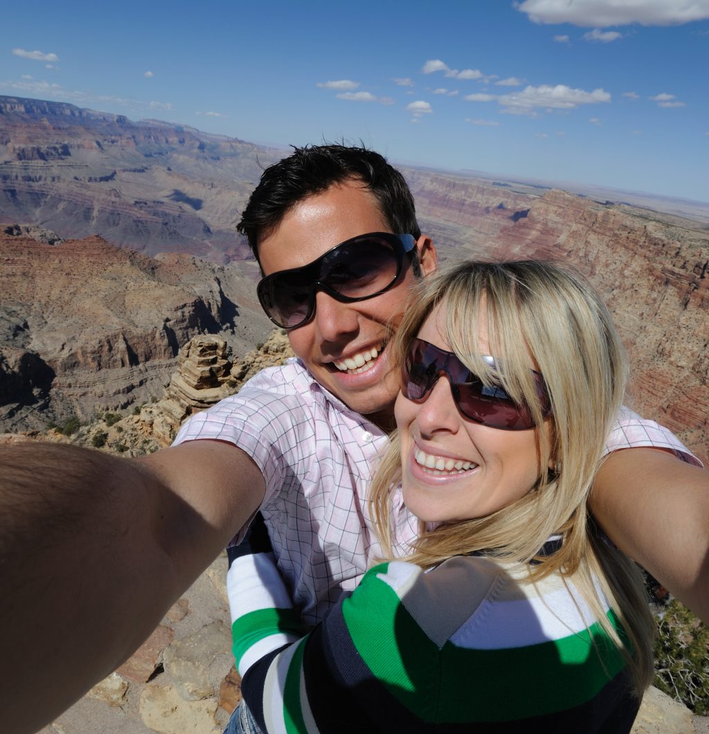 Crazy wide angle self portrait at the edge of Grand Canyon. Nikon D3.